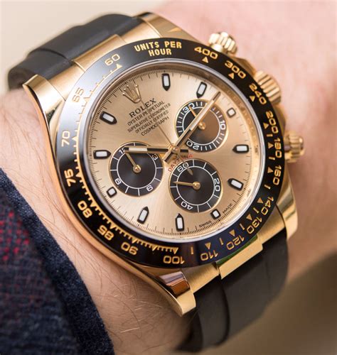 rolex daytona rubber strap gold.